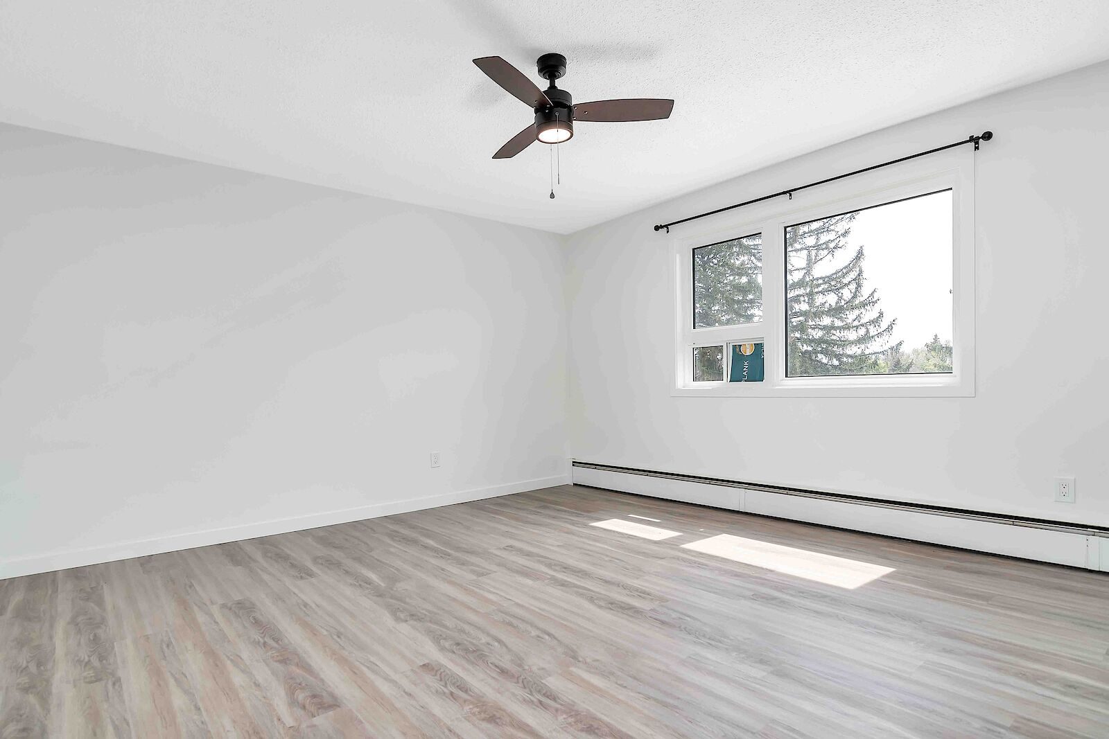 Renovated bedroom at Acadia Apartments