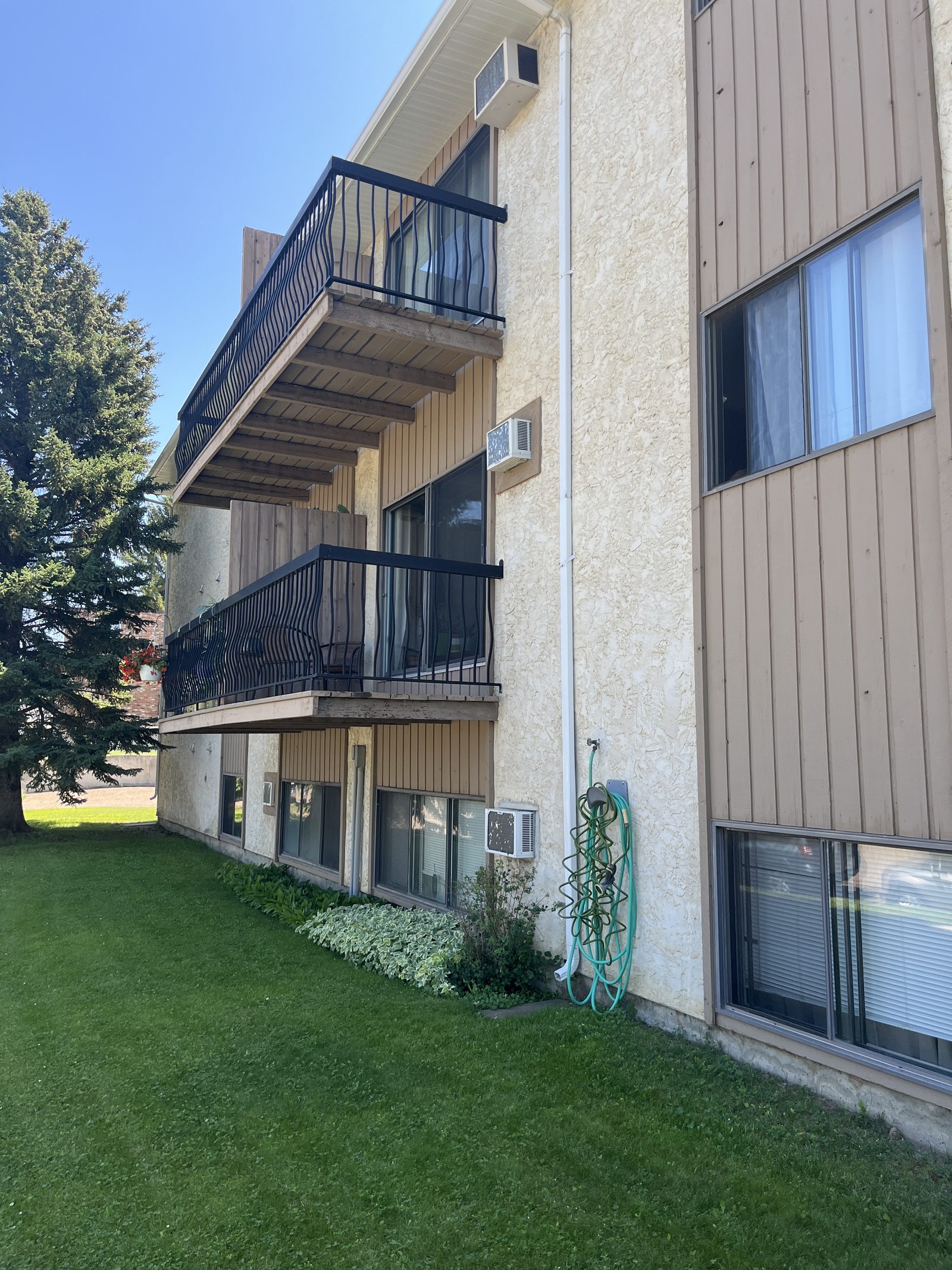Crestwood Apartments exterior with balconies